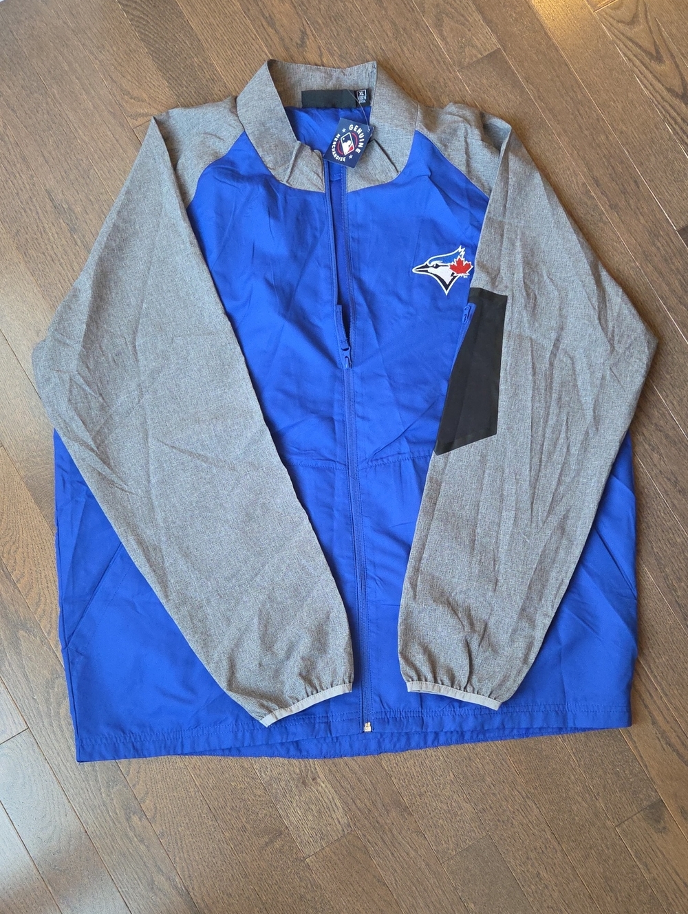 Genuine Merchandise Blue and Gray Men's Raglan Windbreaker with Team Patch